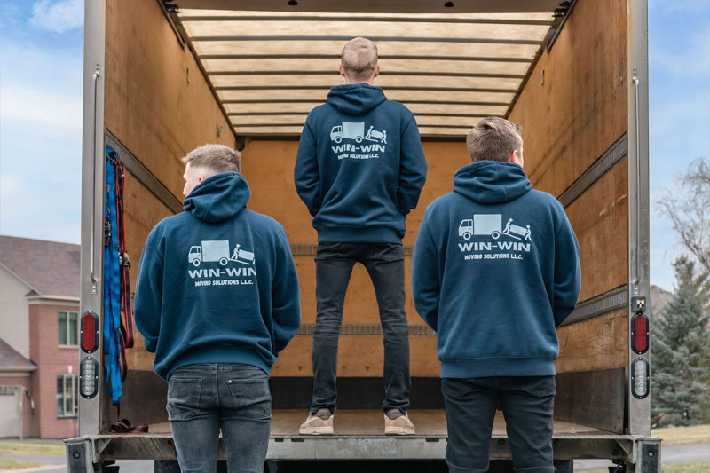 Win Win Moving Solutions team near the truck